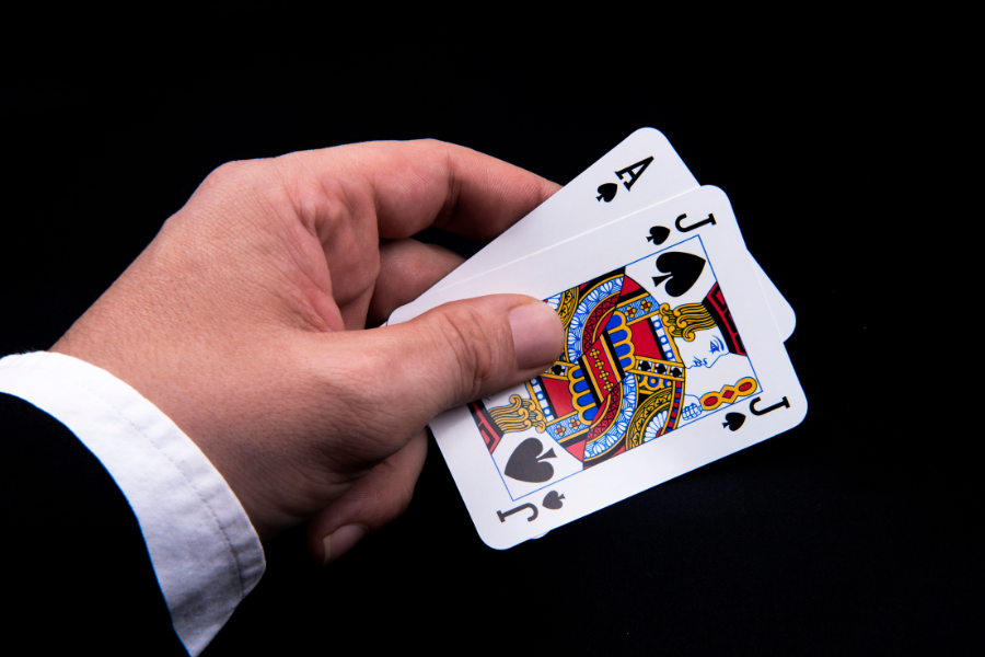 2 cards are held by a hand